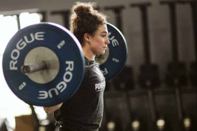 woman power lifting gym